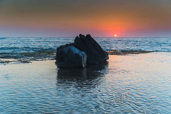 Sunrise Seascape and Rock Ledge