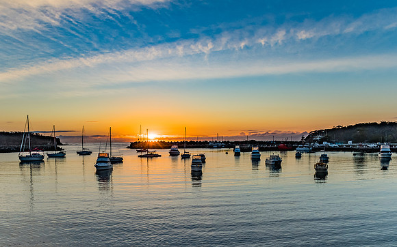 Sunrise and boats in the harbour