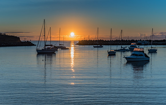 Sunrise and boats in the harbour