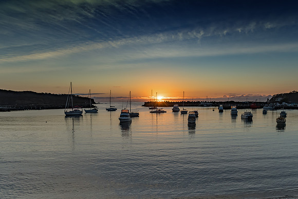 Sunrise and boats in the harbour