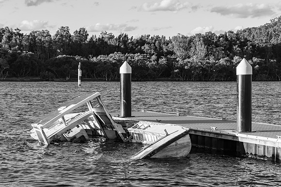 Seen better days - boat sinking in the bay