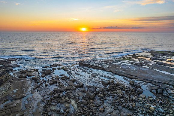 Aerial Sunrise Seascape at Rocky Inlet