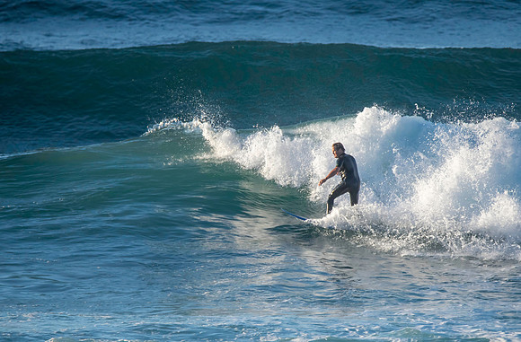 Surfs up early morning surfer