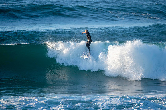 Surfs up early morning surfer