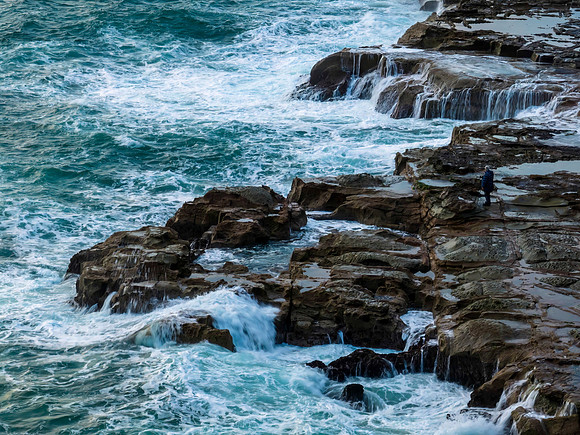 Aerial top down - photographer and the sea