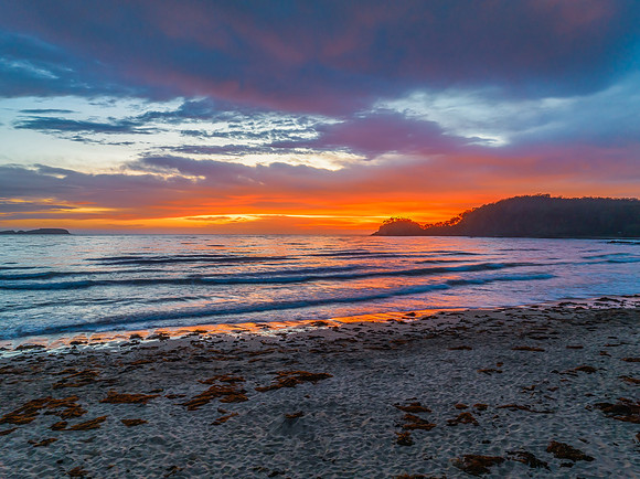 Summer Sunrise Seascape with Rain Clouds