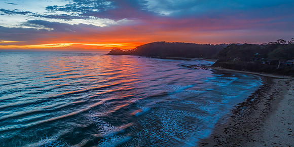 Summer Sunrise Seascape with Rain Clouds