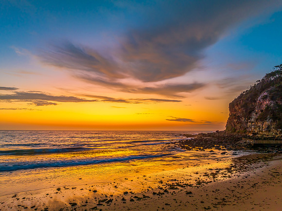Sunrise at the seashore with clouds