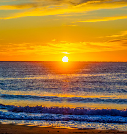 Sunrise at the seaside with high cloud