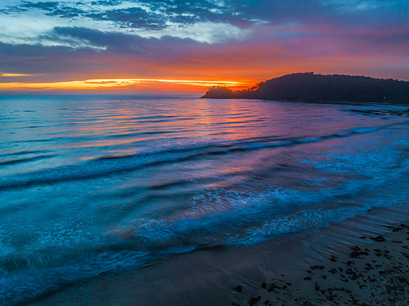 Summer Sunrise Seascape with Rain Clouds
