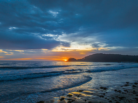 Summer Sunrise Seascape with Rain Clouds
