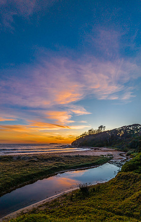 Sunrise at the seaside with high clouds