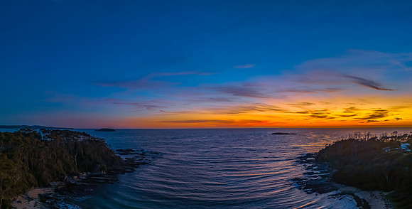 Sunrise at the seaside with high clouds