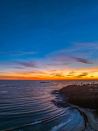 Sunrise at the seaside with high clouds