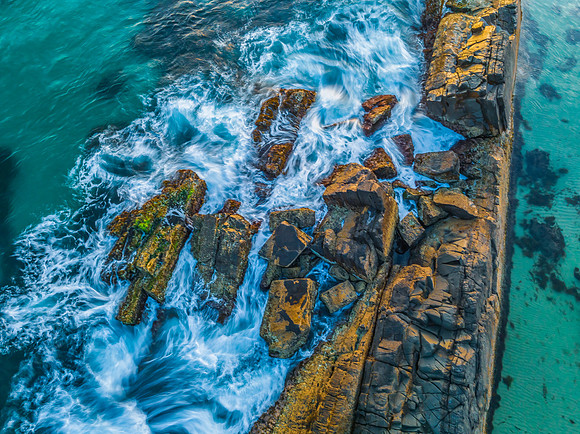 Coastal Sunrise with Rock Formations