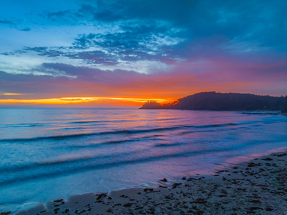 Summer Sunrise Seascape with Rain Clouds