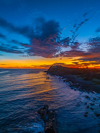 Coastal Sunrise with Rock Formations