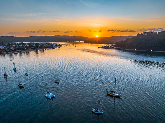 Early morning sunrise views at the waterfront where the water me