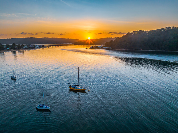 Early morning sunrise views at the waterfront where the water me