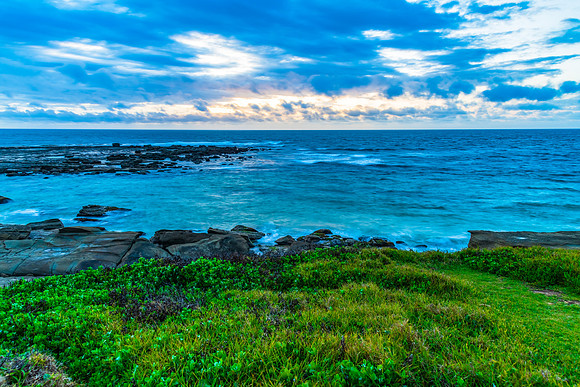 Sunrise seascape with strong southerly winds