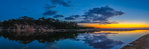 Summer sunrise at the seaside lagoon