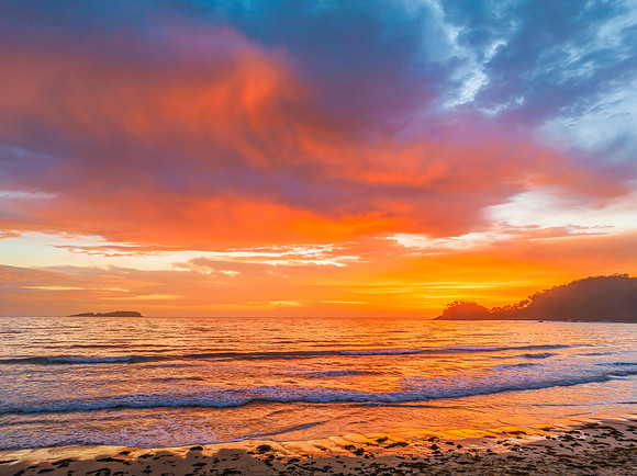 Summer Sunrise Seascape with Rain Clouds