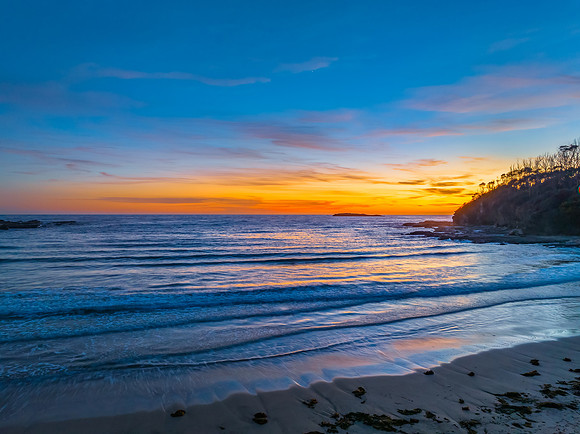 Sunrise at the seaside with high clouds