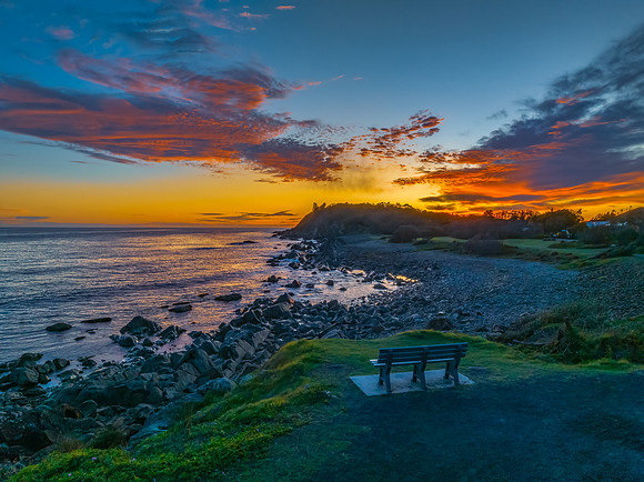 Coastal Sunrise with Rock Formations