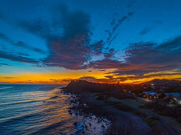 Coastal Sunrise with Rock Formations