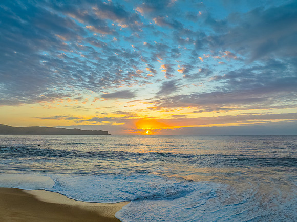 After the rain sunrise at the seaside