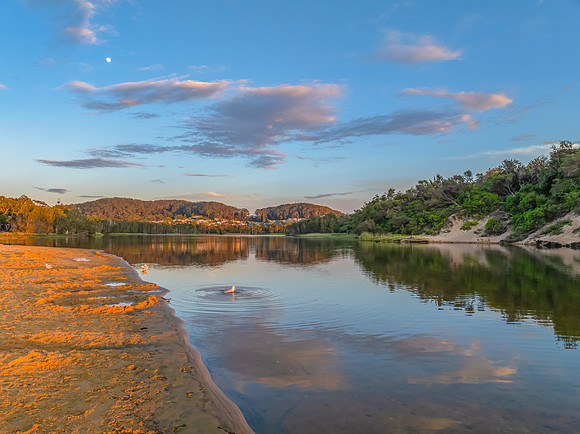 Summer sunrise at the seaside lagoon