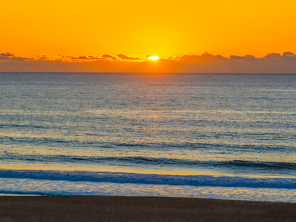 Summer sunrise at the seaside lagoon