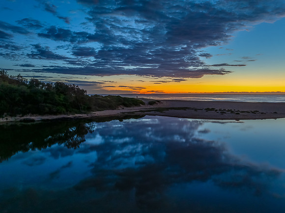 Summer sunrise at the seaside lagoon