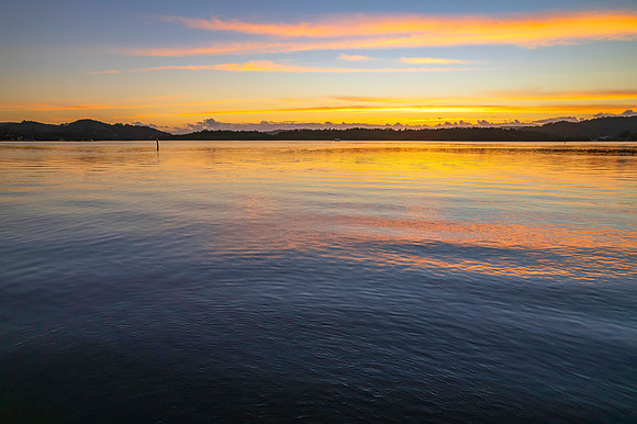 Sunrise over the bay with clouds
