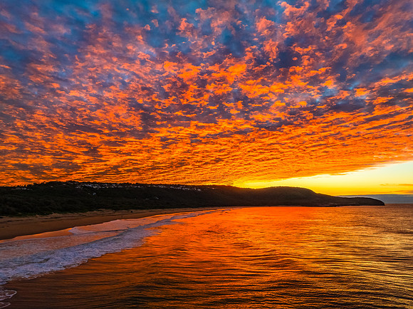 Winter seascape views over the beach with high and medium cloud