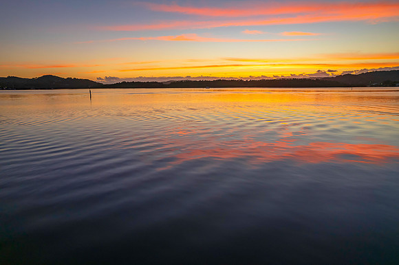 Sunrise over the bay with clouds