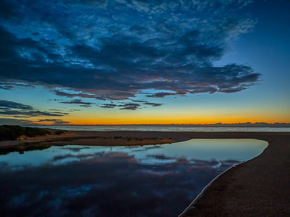 Summer sunrise at the seaside lagoon