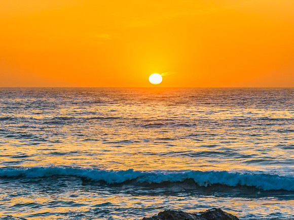 Sunrise seascape with high clouds
