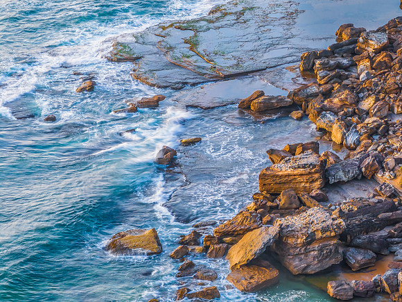 Sunrise over the sea and rocks
