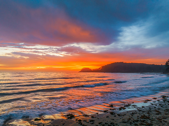Summer Sunrise Seascape with Rain Clouds
