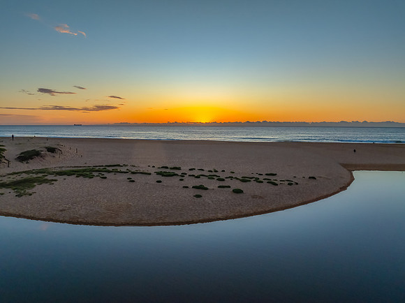 Summer sunrise at the seaside lagoon