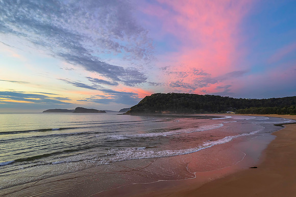 Sunrise seascape with a mix of high and medium clouds