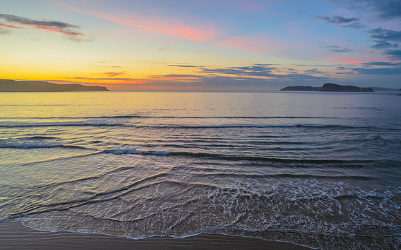 Sunrise seascape with a mix of high and medium clouds