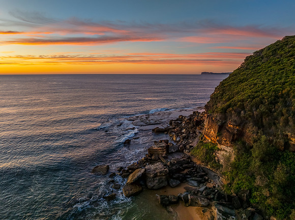 Sunrise at the seaside with high cloud