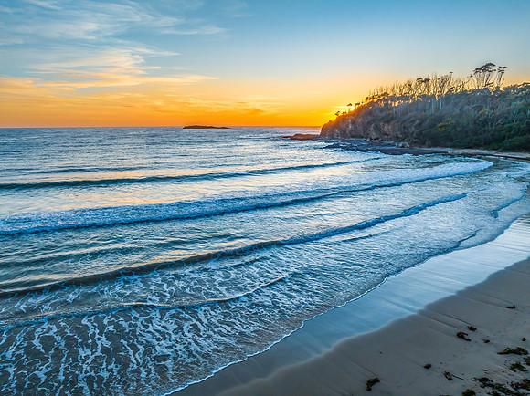Sunrise at the seaside with high clouds