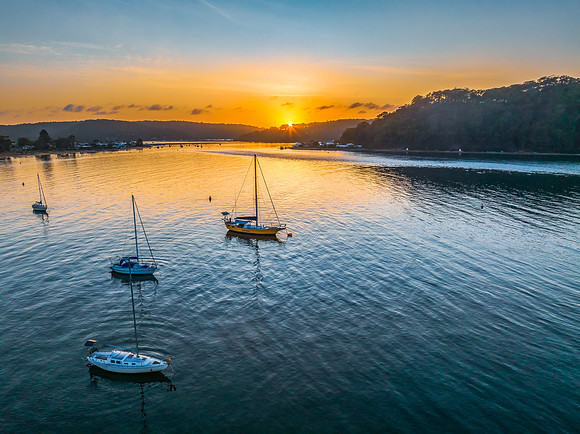 Early morning sunrise views at the waterfront where the water me