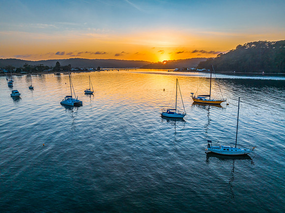 Early morning sunrise views at the waterfront where the water me