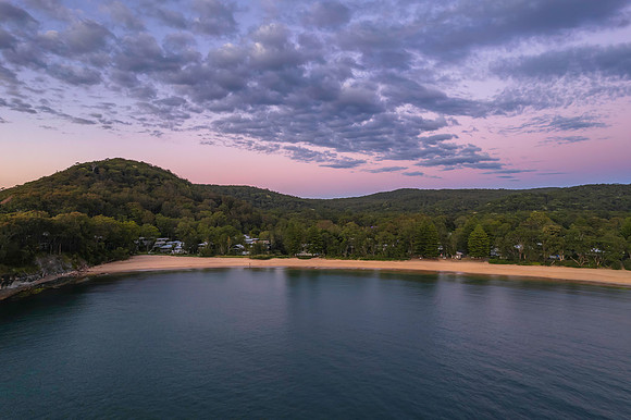 Aerial sunrise seascape with clouds
