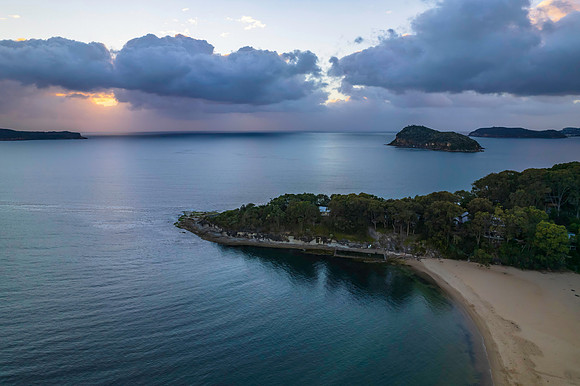 Aerial sunrise seascape with clouds