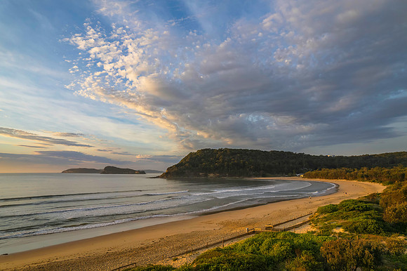 Sunrise seascape with a mix of high and medium clouds